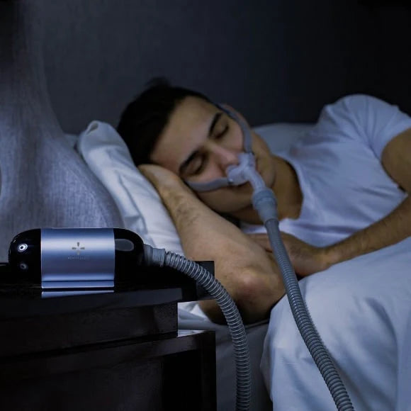 man-in-bed-react-health-luna-travel-cpap-machine-westprimedirect